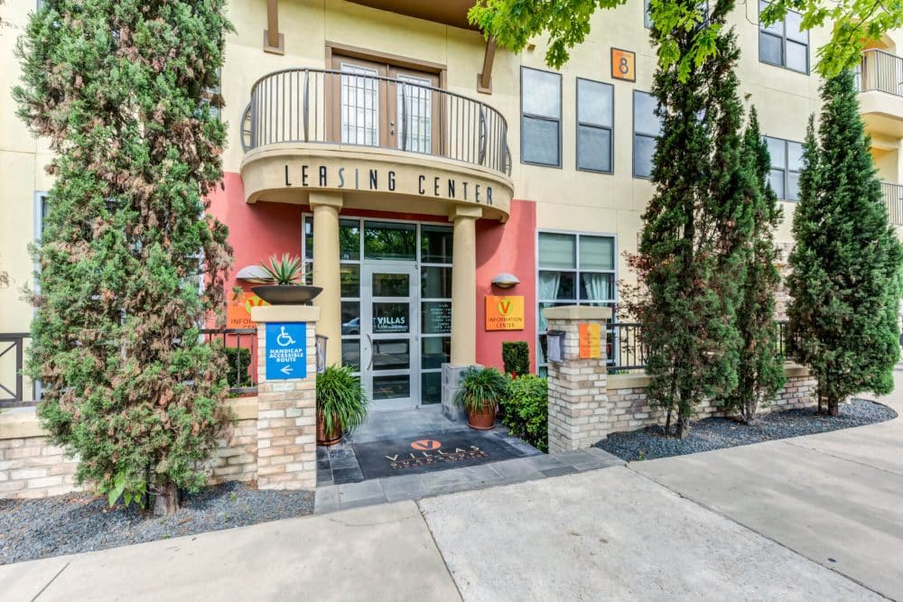 villas on guadalupe off campus apartments near ut austin building exterior leasing office entrance